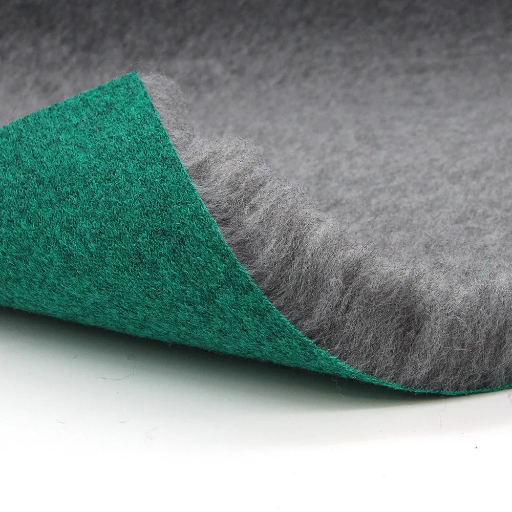 Rolls of green back vet bedding by ProFleece