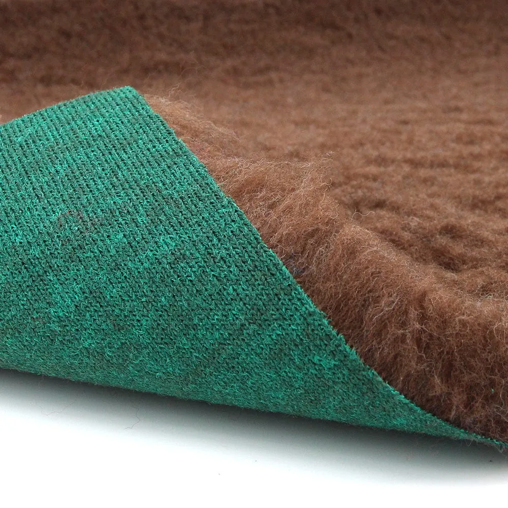 Rolls of green back vet bedding by ProFleece
